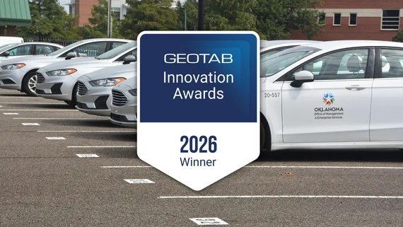 2026 Geotab Innovation Award winner badge in front of OMES-branded cars.
