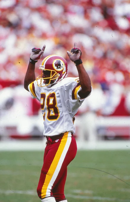 Photo of Darrell Green playing football.