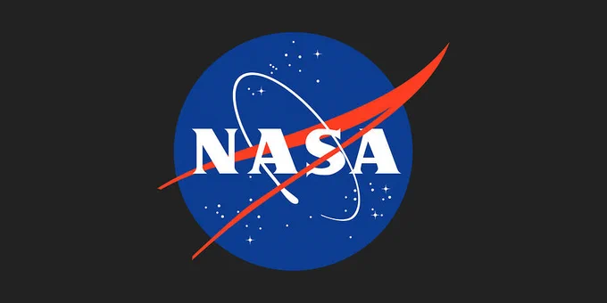 A graphic with NASA's "meatball" logo, which consists of a blue circle dotted with stars and crossed by a red, V-shaped swoosh. "NASA" is written in large white text on the circle, which is set against a solid black background. Credit: NASA