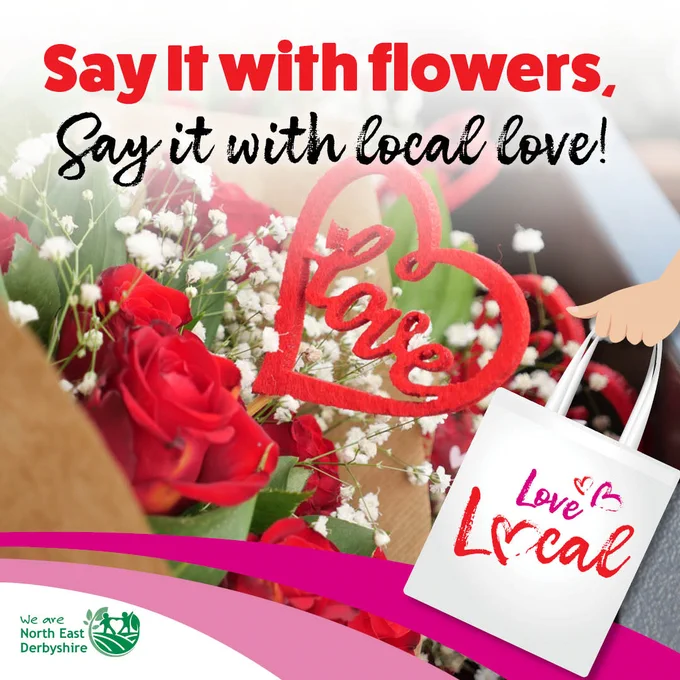 Red roses and white flowers with a heart-shaped "Love" sign. A tote bag reads "Love Local" promoting North East Derbyshire.