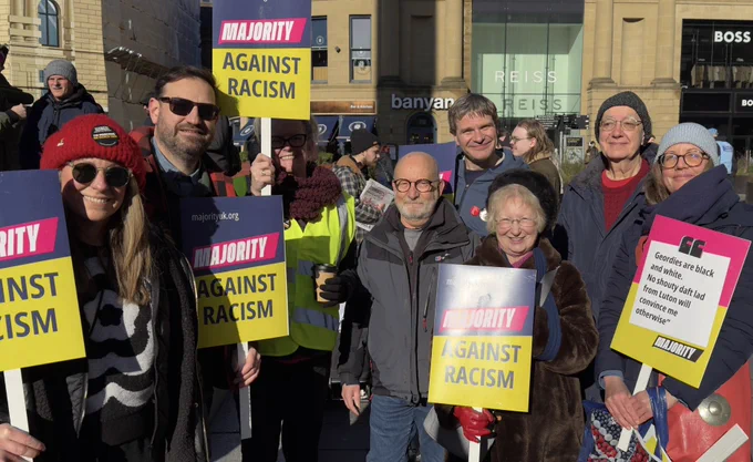 People with placards standing in Newcastle city centre.