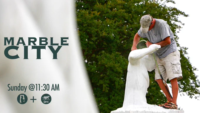 A person is sculpting a large white statue outdoors, surrounded by greenery. The text reads "Marble City" with mention of a schedule: "Sunday @ 11:30 AM." Logos of APT and PBS are also visible.