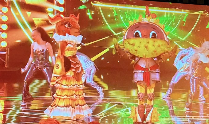 Ben Shepard as Conkers and the winner of Masked Singer Keisha Buchanan