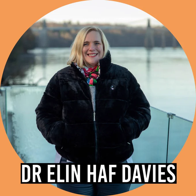 Dr. Elin Haf Davies smiles outdoors in winter coat.
