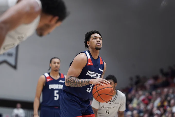 Jimmie shooting at free throw line