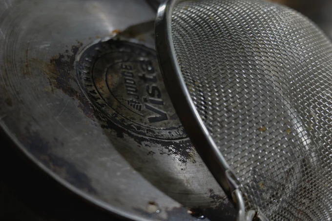 washing up, saucepan and sieve 
