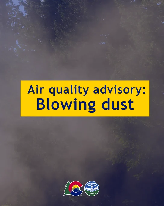 Blowing dust alert text on yellow background over image of trees and haze.
Logos at the bottom.
