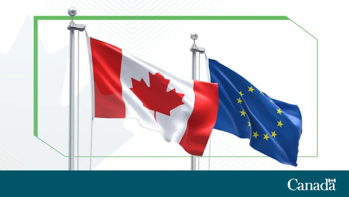 An image of the Canada and European Union flags side by side.