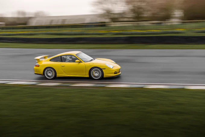Porsche 996.2 GT3 Speed Yellow at Goodwood Motor Circuit
