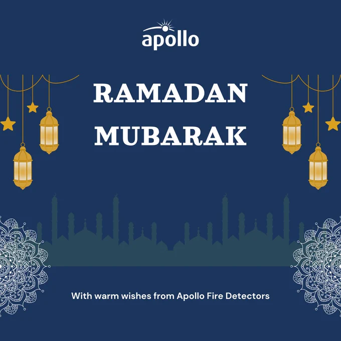 Dark blue Ramadan Mubarak greeting with golden lanterns and intricate white mandala designs from Apollo Fire Detectors.