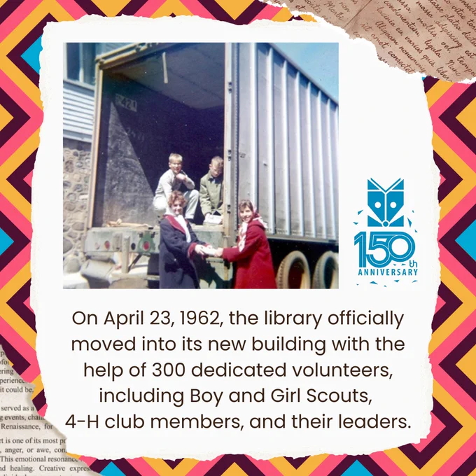 Photo of volunteers loading a truck to help move the library.