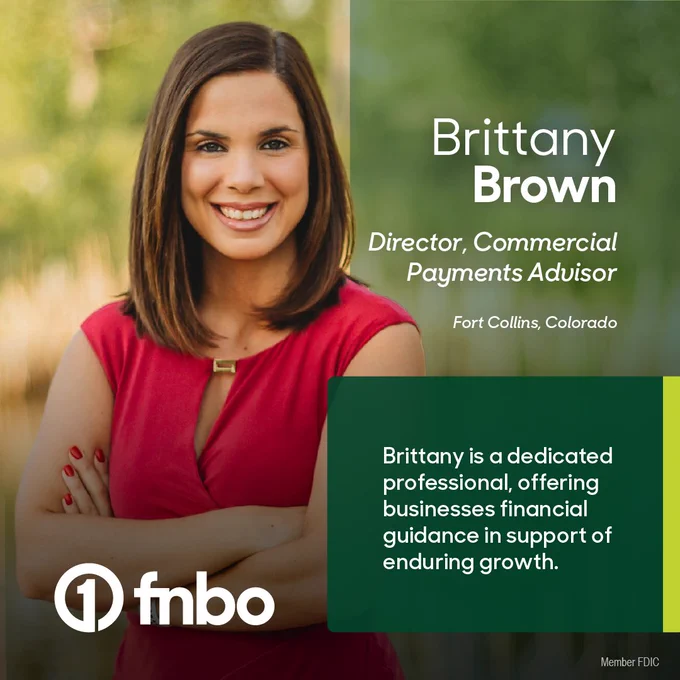 A person smiling stands outdoors with arms crossed, wearing a red top. Text reads: "Brittany Brown, Director, Commercial Payments Advisor, Fort Collins, Colorado. Brittany is a dedicated professional, offering businesses financial guidance in support of enduring growth." The FNBO logo  is at the bottom.