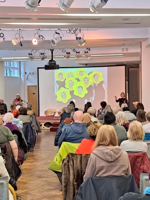 Audience facing screen of comic images 