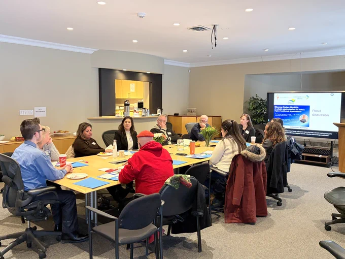 Event attendees participate in a discussion of disability-inclusive employment in healthcare in the Halton region