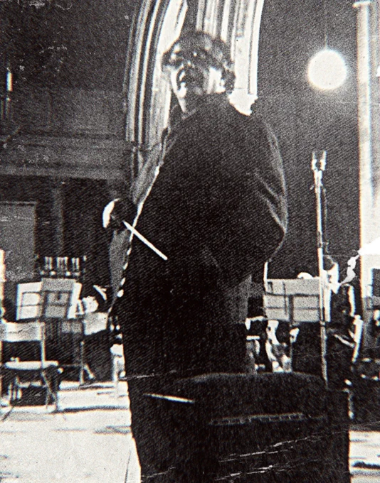 Bernard Herrmann photographed during the recording of his score for Larry Cohen’s IT’S ALIVE at St. Giles Cripplegate Church, London in 1973.