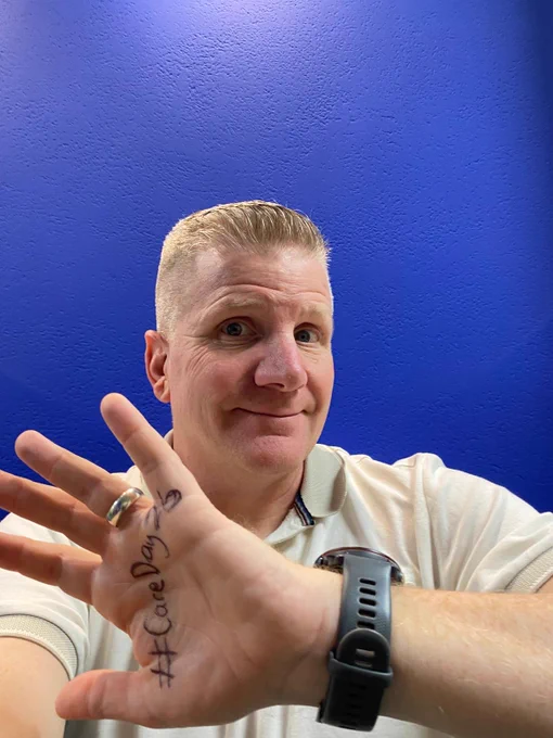 Commissioner Chris Quinn in a series of pictures with a variety of expressions on his face and #CareDay26 written on the palm of his hand.