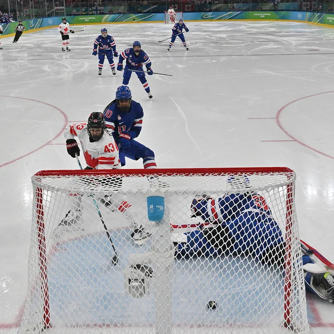 MILAN, ITALY - FEBRUARY 19: Kristin O'Neill #43 of Team Canada scores the opening goal during the women's gold medal ice hockey match between USA and Canada at the Milano Santagiulia Ice Hockey Arena during the Milano Cortina 2026 Winter Olympic Games on February 19, 2026 in Milan, Italy. (Photo by Alexander Nemenov - Pool/Getty Images)
