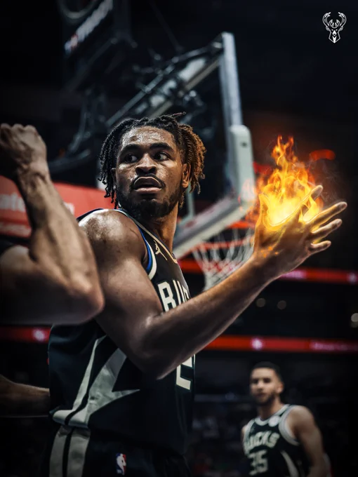 A graphic featuring a photo of Cam Thomas with a flame in his hand.