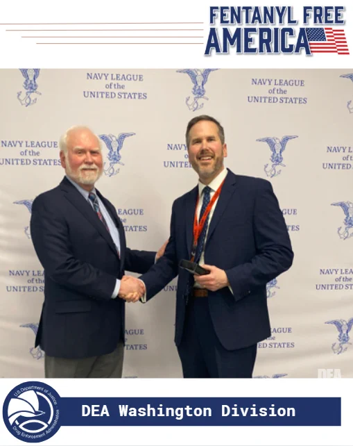 DEA Washington Division's DPM Wood (right) with Navy League of the United States representative. 