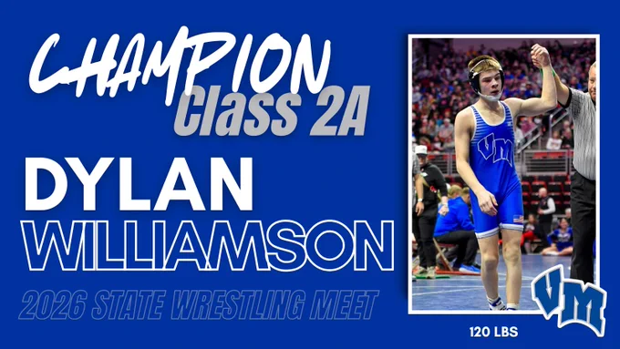 Wrestler Dylan Williamson in blue singlet with VM logo, celebrating 2026 Class 2A state wrestling championship at 120 lbs.