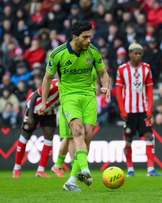 Raúl Jiménez takes - and scores - a penalty.