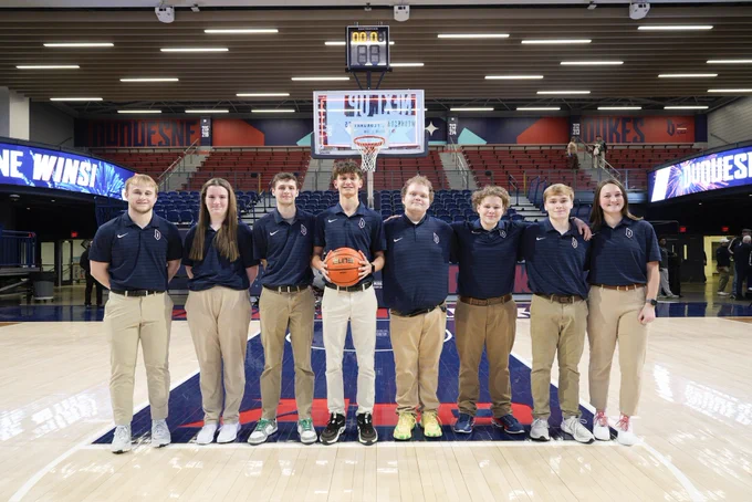 Duquesne managers posing for picture