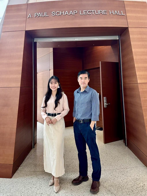 PhD candidate April Sweet Tapayan standing next to advisor Hien Nguyen