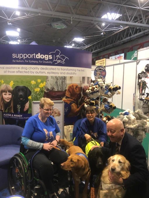 Steve Darling MP with two members of the team at support dogs and three supports dogs! 