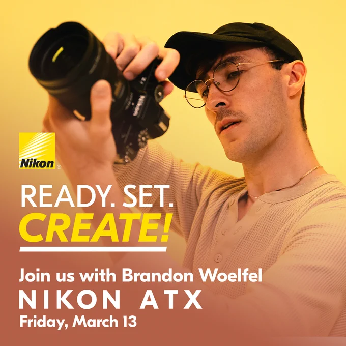 A photo of Brandon Woelfel holding a Nikon mirrorless camera up to his face against a warm yellow background. On-screen text reads: “READY. SET. CREATE! Join us with Brandon Woelfel. NIKON ATX. Friday, March 13.” The Nikon logo appears in the top left corner.