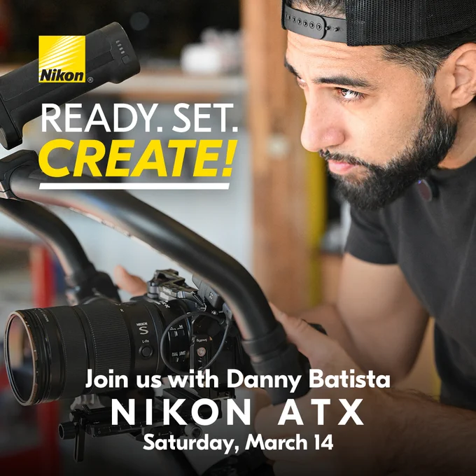 A photo of a man wearing a backward cap adjusting a Nikon mirrorless camera mounted on a stabilizer rig indoors. On-screen text reads: “READY. SET. CREATE! Join us with Danny Batista. NIKON ATX. Saturday, March 14.” The Nikon logo appears in the top left corner.