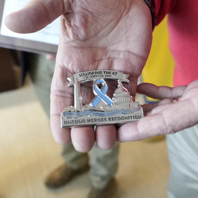 The commemorative challenge coin from the DC Fire and EMS Foundation and the Families of Flight 5342