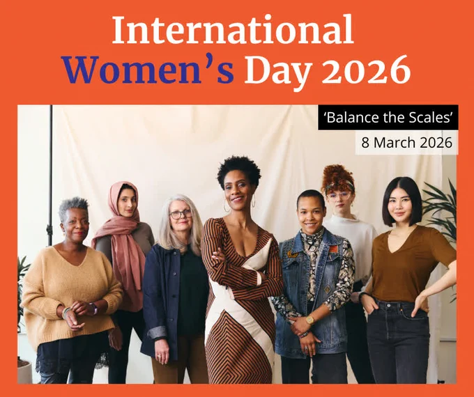 Text reads ‘International Women’s Day 2026. Balance the Scales.’ Photo of a group of women standing together, smiling.