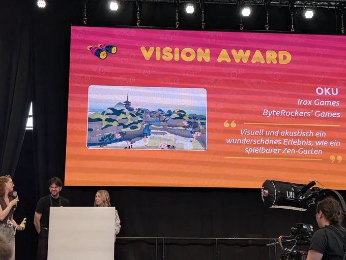 Game Designer on stage, Vision Award given to Irox Games & ByteRockers' Games for OKU
