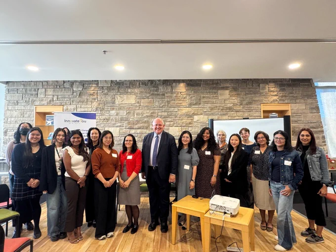 Girls in a STEAM program mentors at Markham Public Library