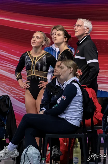 Several people, two who are wearing leotards, are looking at something above them. Graham Dodd/Airtime Photos
