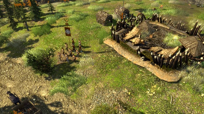 Vue en plongée d'une partie du jeu 0 A.D. montrant un village et un groupe de soldats.
- À gauche, un groupe de soldats et d'unités alignés près d'un drapeau avec un symbole de taureau.
- À droite, un bâtiment en bois partiellement construit, entouré de palissades en bois et de deux coffres en bois.
- En arrière-plan, des arbres, des buissons et des animaux comme des cerfs et des sangliers.
L'interface du jeu est visible en bas à droite avec des informations sur les ressources et les unités.