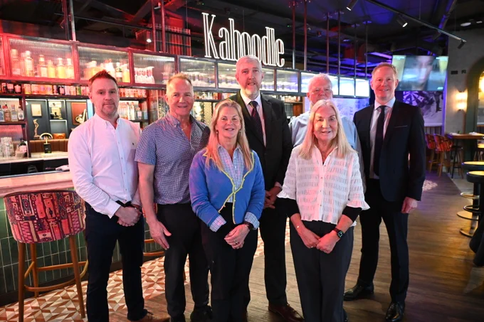 Left to Right: Gordon Davidson, FJJ Consulting; Brendan Duddy Jr, Duddy Group; Shauna Downey, Duddy Group; John O’Dowd, Finance Minister; Patricia Duddy, Duddy Group; Larry Duddy, Duddy Group; Andrew Coggins, CBRE NI