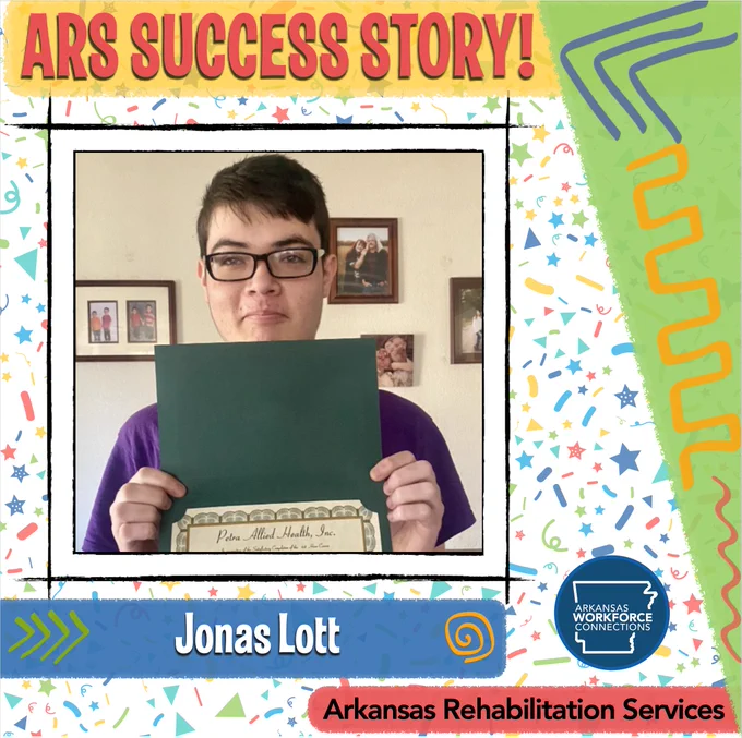 Jonas Lott smiles and shows off his veterinary assistant certification.