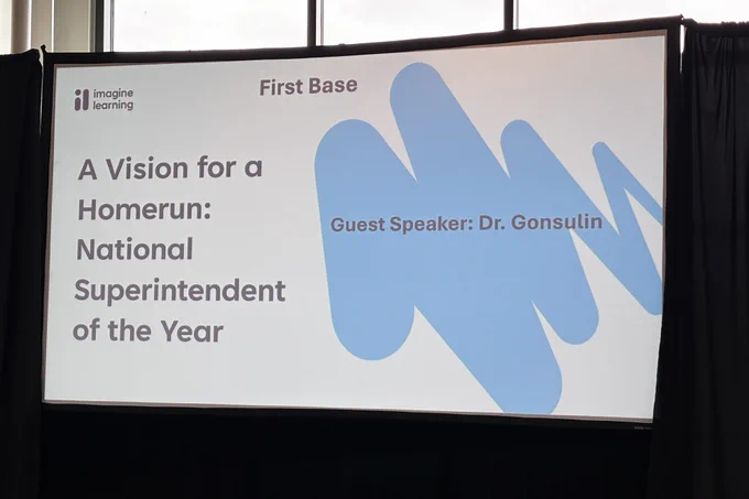Image of a PowerPoint screen. It reads "A Vision for a Homerun: National Superintendent of the Year, Guest Speaker, Dr. Gonsoulin.