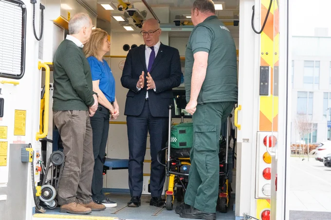 The First Minister with representatives from Save a Life for Scotland, Scottish Ambulance Service staff and cardiac arrest survivor John Sinclair.