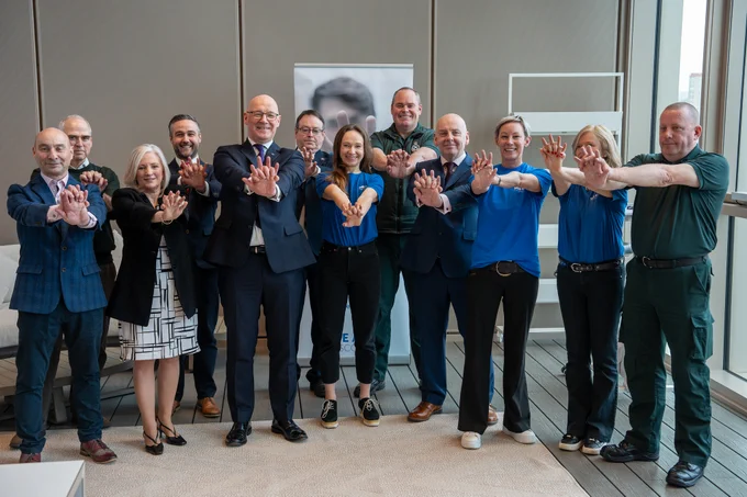 The First Minister with representatives from Save a Life for Scotland, Scottish Ambulance Service staff and cardiac arrest survivor John Sinclair.