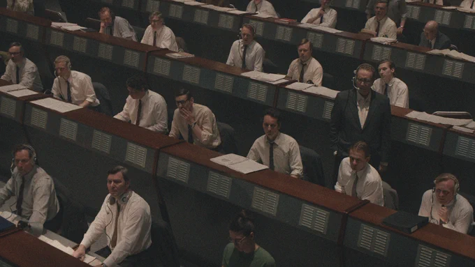 From Star City, an image of members seated inside Soviet space program command center.