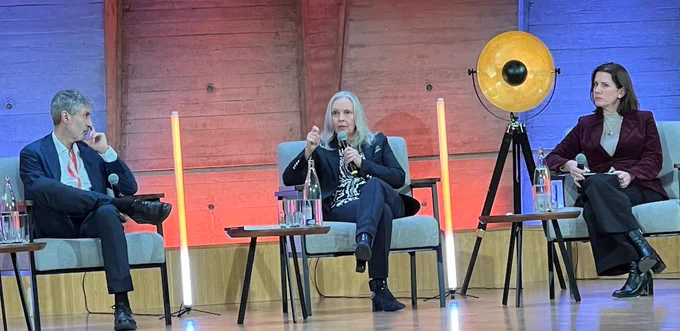 Gillian Hadfield on stage with Yoshua Bengio and Susan Leavy