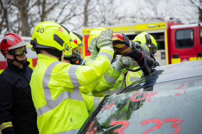 Firefighters on a road traffic collision exercise