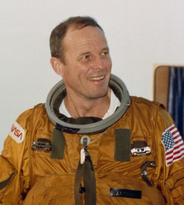 Astronaut Jack R. Lousma, STS-3 commander, walks from a transport van to Launch Pad 39A to participate in a simulated countdown and launch for NASA's third orbital flight test in the space shuttle Columbia in February 1982. Credit: NASA