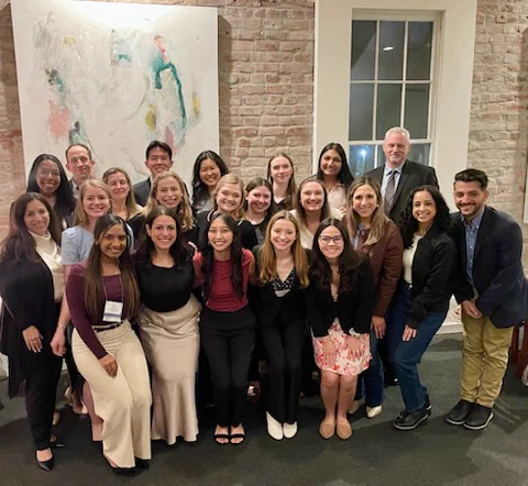 Division of Neonatology members celebrating at dinner.