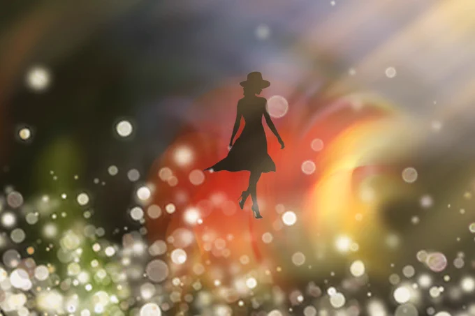 Digital art composition featuring a black silhouette of a woman in a hat and dress, floating against a vibrant, dreamlike background. The backdrop consists of soft, swirling orange and yellow light rays resembling flower petals, with layers of glowing bokeh effects and blurred light spots at the bottom. The piece has a surreal, magical atmosphere created through digital photo manipulation.  Copyright @InspiredHobbies