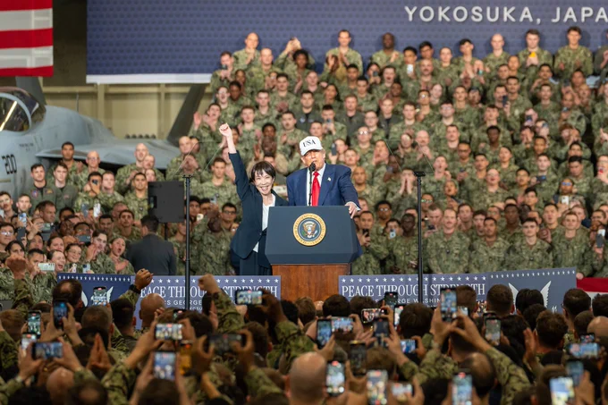 President Trump and Prime Minister Takaichi standing side by side in Yokosuka, Japan.