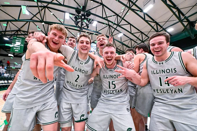 Titan men’s basketball celebrating their CCIW Tournament Championship