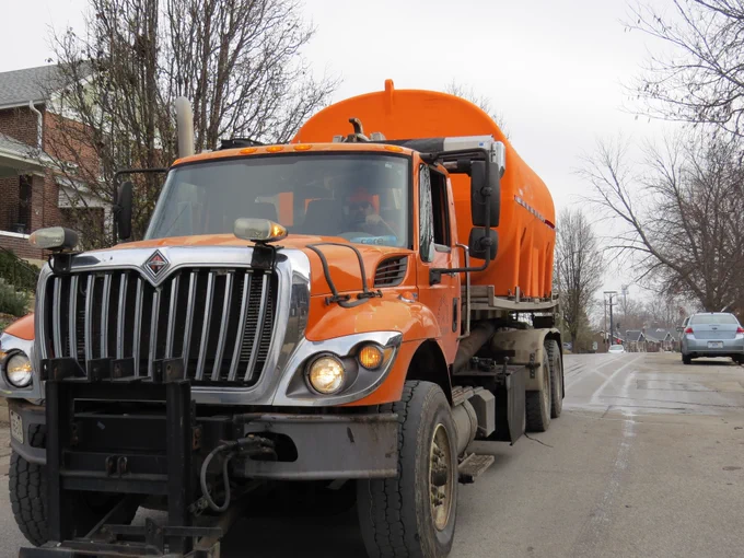 A photo of a City of St. Louis brine truck pretreating a street ahead of winter weather.